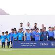 Portuguesa (a única mulher na imagem) treina e é coordenadora técnica do futebol de uma das academias do Al-Ula, na cidade com o mesmo nome - Foto: D.R.