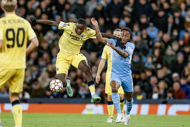 Noah Mbamba, Bruges. Com 16 anos, 9 meses e 14 dias jogou frente ao Manchester City, em 2021