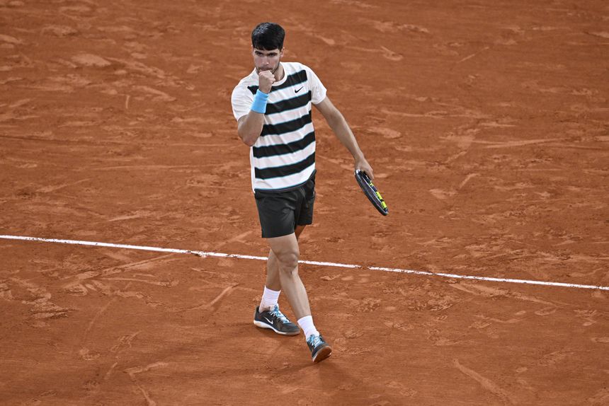 Carlos Alcaraz festeja triunfo sobre Lorenzo Musetti