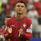 Ronaldo a chorar no final do jogo com Espanha. Foto: EPA/CHRISTOPHER NEUNDORF