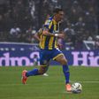 Di María conduz a bola em jogo do Rosario Central