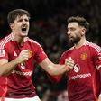 Harry Maguire a celebrar o golo da reviravolta, após assistência de Bruno Fernandes