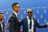 Cristiano Ronaldo com Patrice Evra, antigos colegas no Manchester United e Juventus