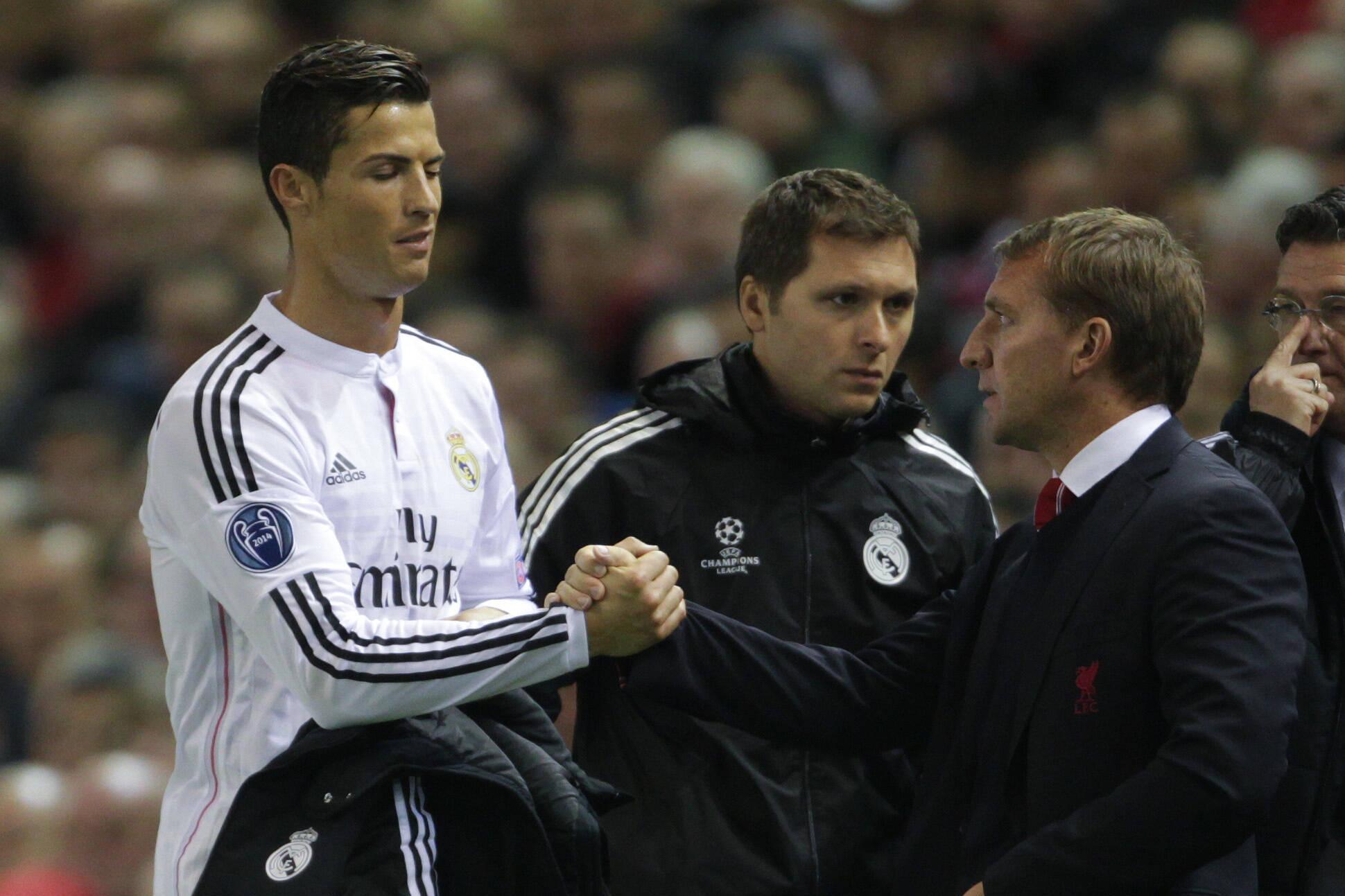 Brendan Rodgers e Cristiano Ronaldo a defrontarem-se num Liverpool-Real Madrid na Champions