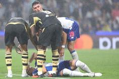 Veiga no chão no FC Porto-Manchester City - Foto: Catarina Morais/Kapta +