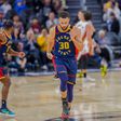 Stephen Curry (Golden State Warriors) durante jogo com os Miami Heat na NBA