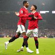 Marcus Rashford e Jadon Sancho com a camisola do Manchester United