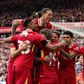 Jogadores do Liverpool a celebrarem a reviravolta em Anfield diante do Southampton