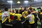 Jogadores do AEK a festejarem o golo tardio de João Mário