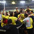 Jogadores do AEK a festejarem o golo tardio de João Mário