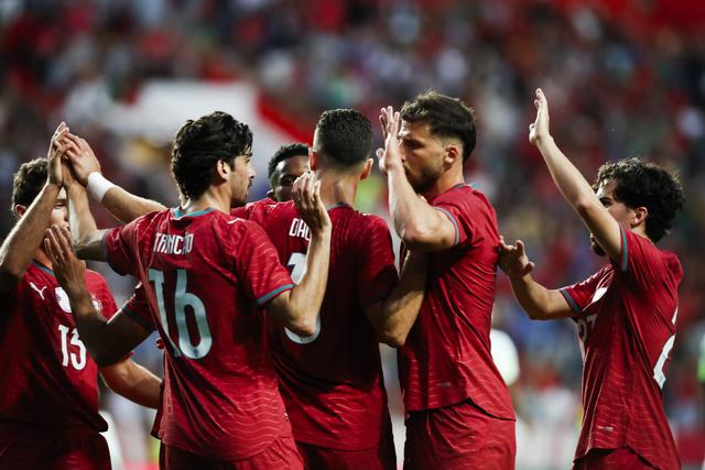 Jogadores da Seleção felicitam Trincão após o golo de Portugal frente à Nigéria - Foto: PAULO CUNHA/LUSA
