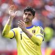 Courtois muito emotivo ao sair de campo (IMAGO)