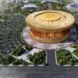 O custo do projeto ronda os 34 mil milhões de euros e o recinto será construído no centro do amplo empreendimento da Cidade Desportiva Olímpica. O estádio tem o nome e a forma inspirados num tambor de bronze tradicional vietnamita