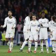 Jogadores do Real Madrid a celebrarem uma grande penalidade falhada pelo Atlético
