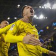 Dortmund sofre mas está nos quartos de final