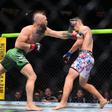 Max Holloway a lutar com Conor McGregor