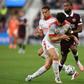 Dedic e Manu Silva no Hearts-Benfica - Foto: Imago