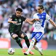 Kevin Pina, que passou por Portugal, com o iraniano Mohammadjava - Foto: Imago