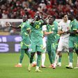 Jogadores do Senegal diante de Marrocos