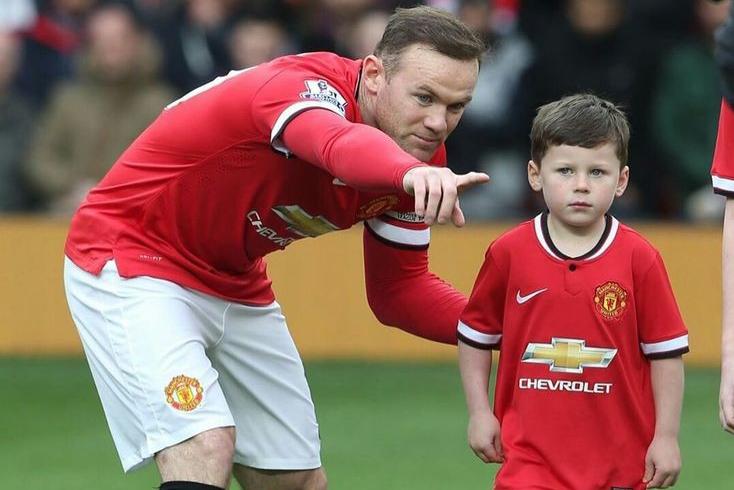 Kay Rooney, com o pai Wayne - foto: IMAGO