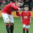 Kay Rooney, com o pai Wayne - foto: IMAGO