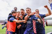Jogadores do PSV a celebrarem o golo de Luuk de Jong, o segundo no jogo
