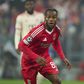 Renato Sanches, médio do Benfica, em pose enérgica durante um jogo