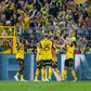 Borussia Dortmund a celebrar um dos três golos marcados ao M'gladbach