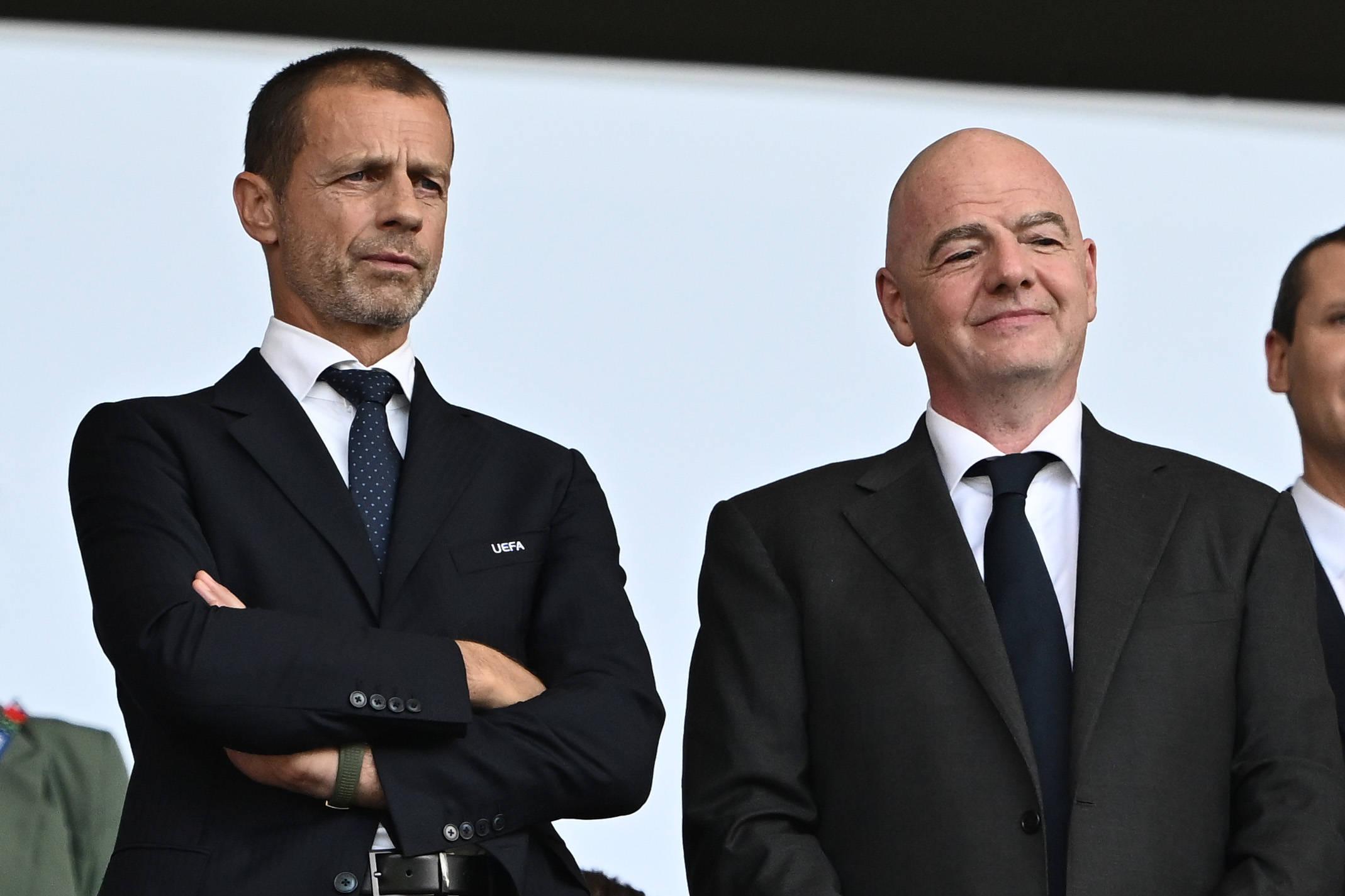 Aleksander Ceferin, presidente da UEFA, e Gianni Infantino, presidente da FIFA (IMAGO)