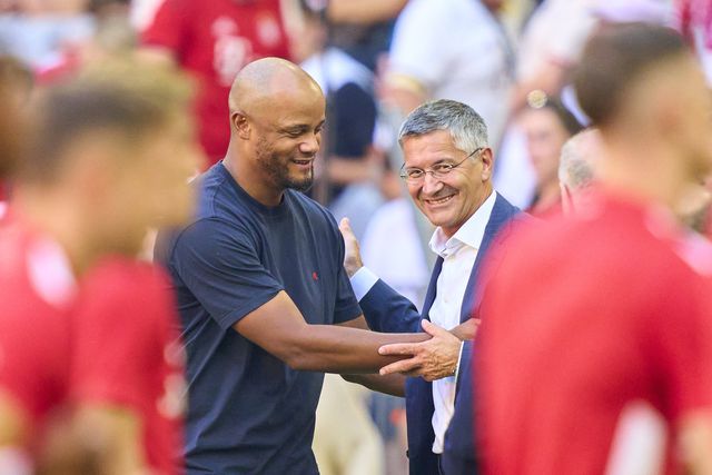 Vincent Kompany e Herbert Hainer