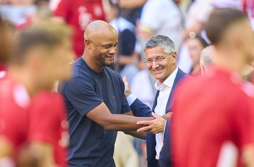 Vincent Kompany e Herbert Hainer