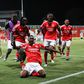 Olívio Tomé festeja o golo que valeu a vitória do Benfica sobre o Sporting na Liga Revelação