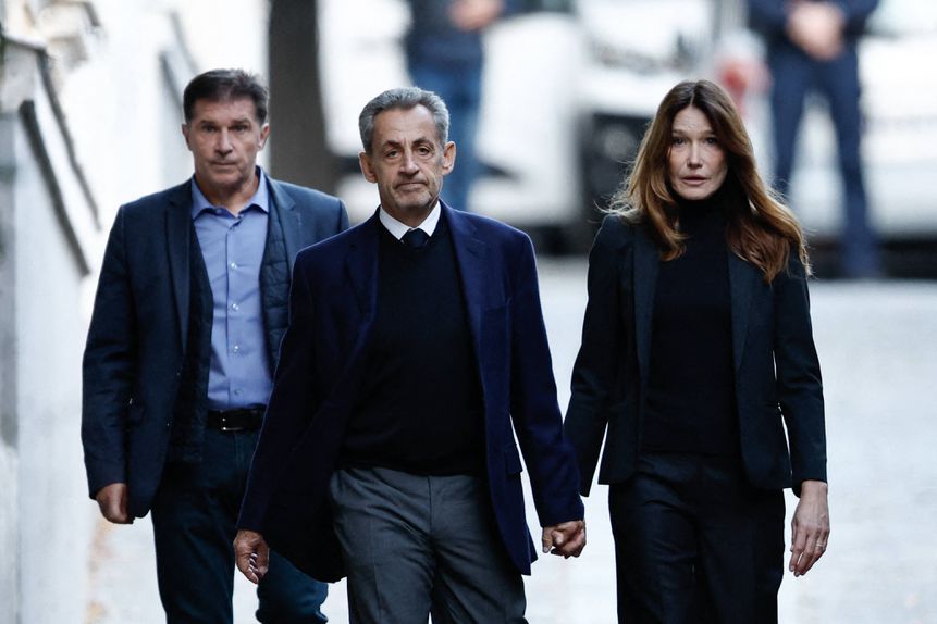 Nicolas Sarkozy e a mulher Carla Bruni