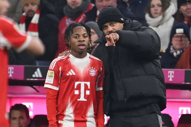 Wisdom Mike com Vincent Kompany