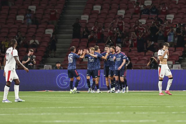 Festejos dos jogadores do Arsenal (HOW HWEE YOUNG/EPA)