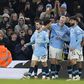 jogadores Manchester City celebram golo frente ao Chelsea