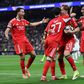 Jogadores do Benfica festejam o golo de Rafa Silva em Madrid