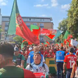 «Sou, de Portugal eu sou!» Arranca a marcha dos adeptos portugueses até ao estádio
