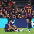 Xavi Espart no chão em dificuldades no início do El Clásico