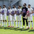 Jogadores do Irão durante o hino nacional contra a Nigéria