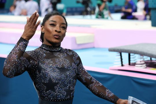 97 minutos a olhar para Simone Biles e ver história. Beijo! Beijo!