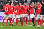 Jogadores do Benfica celebram vitória sobre a Juventus na Liga dos Campeões 2024/25