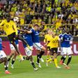 Bundesliga: expulsão não travou ambição do Dortmund