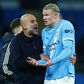 Pep Guardiola e Erling Haaland após a vitória do Manchester City frente ao Leeds