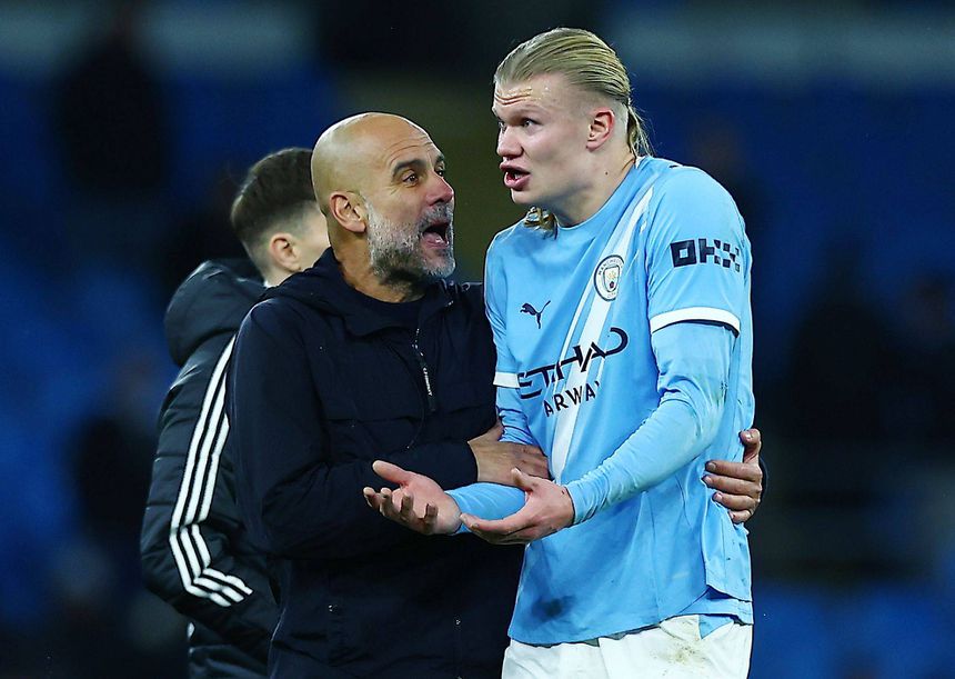 Pep Guardiola e Erling Haaland após a vitória do Manchester City frente ao Leeds