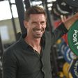 Adrien Silva sorridente no regresso à Academia de Alcochete - Foto: Miguel Nunes