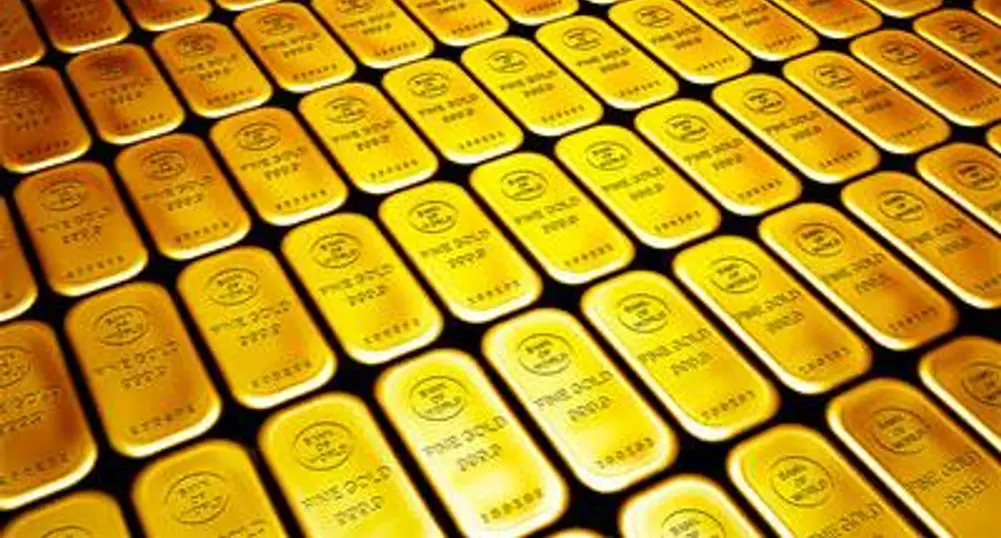 Нов рекорд за златото, спад на суровините