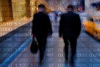 Американските акции се понижиха въпреки намека на Фед за край на затягането