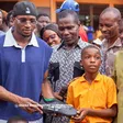 Kudus donates books, sports kits to Nima Basic 1, urges students to prioritize education