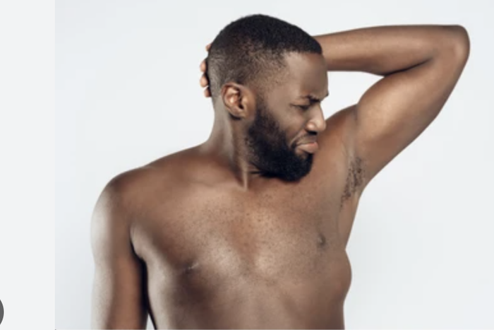 Man watching arrmpit (Shutterstock)